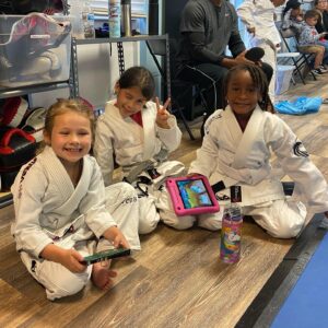 kids sitting at BJJ